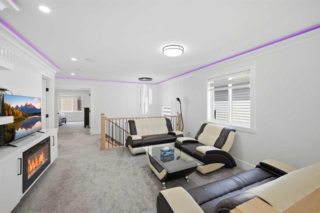 15 Saddlecrest Link Ne, Calgary, AB - Indoor With Fireplace