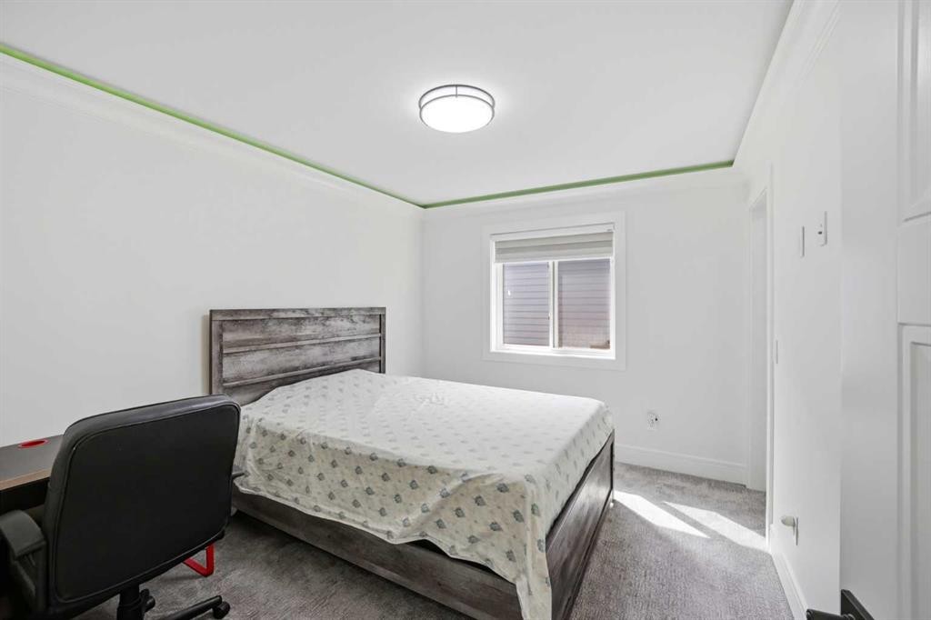 15 Saddlecrest Link Ne, Calgary, AB - Indoor Photo Showing Bedroom
