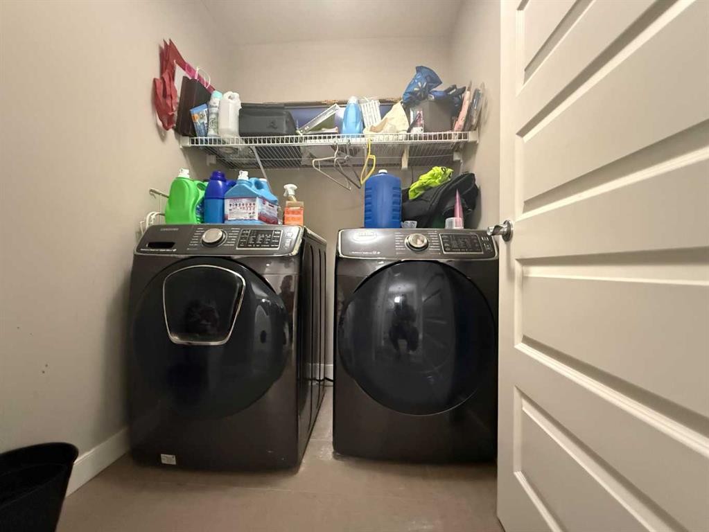 21 Red Embers Common Ne, Calgary, AB - Indoor Photo Showing Laundry Room