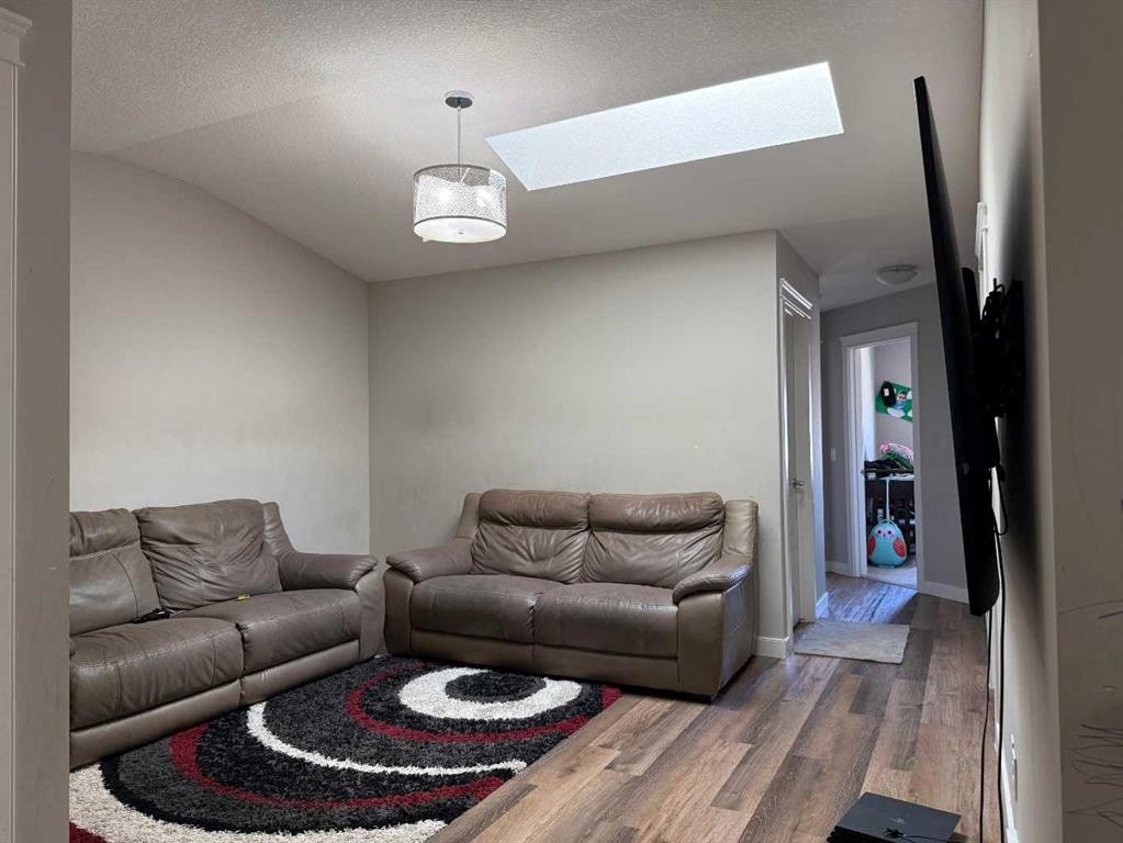 21 Red Embers Common Ne, Calgary, AB - Indoor Photo Showing Living Room