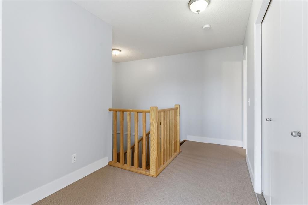 207-323 Fourth Avenue, Strathmore, AB - Indoor Photo Showing Other Room