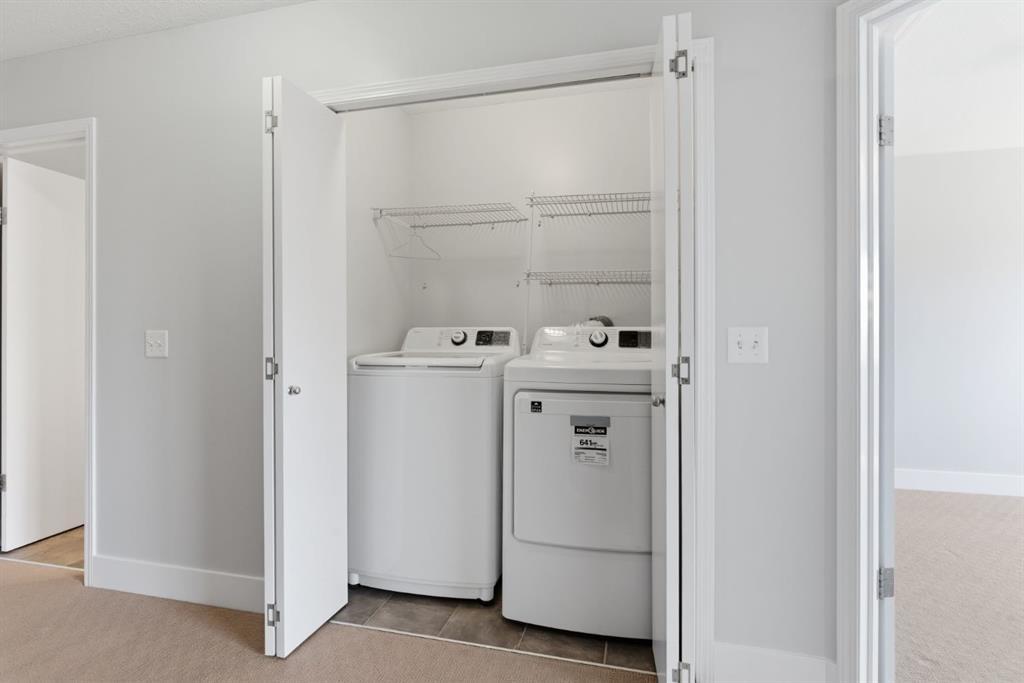 207-323 Fourth Avenue, Strathmore, AB - Indoor Photo Showing Laundry Room