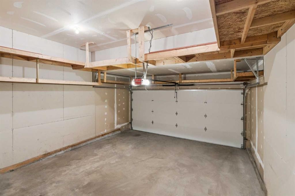 327 Panamount Point Nw, Calgary, AB - Indoor Photo Showing Garage