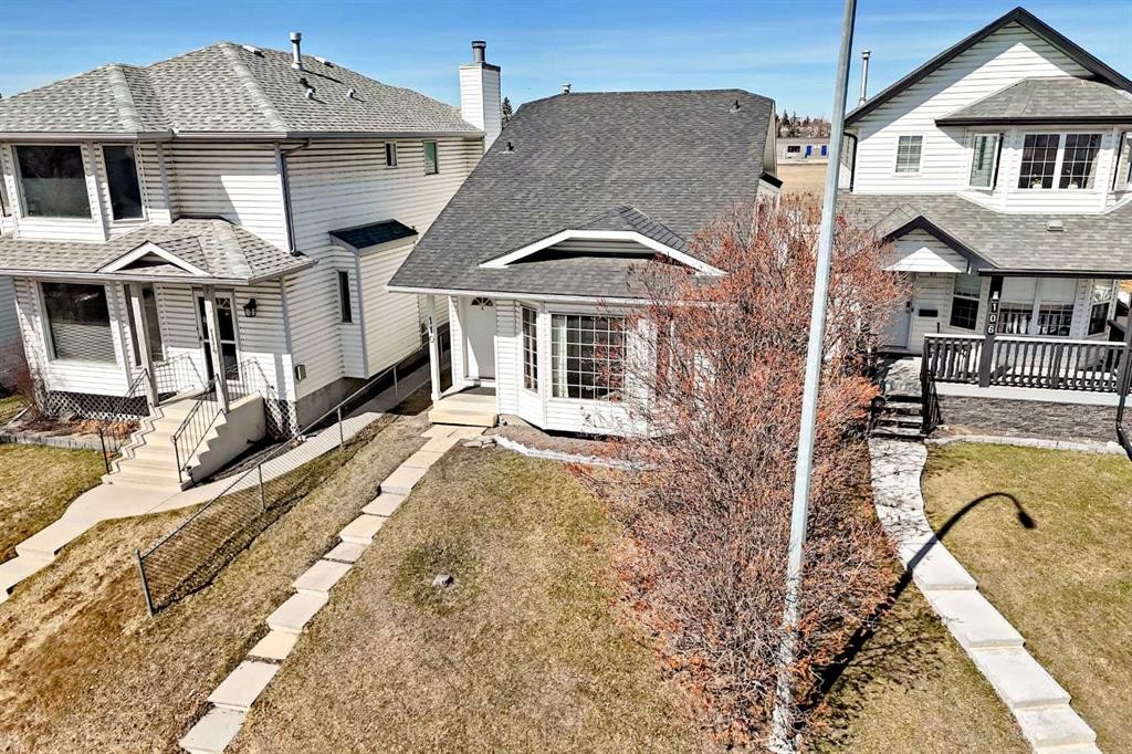 110 Erin Meadow Close Se, Calgary, AB - Outdoor With Deck Patio Veranda
