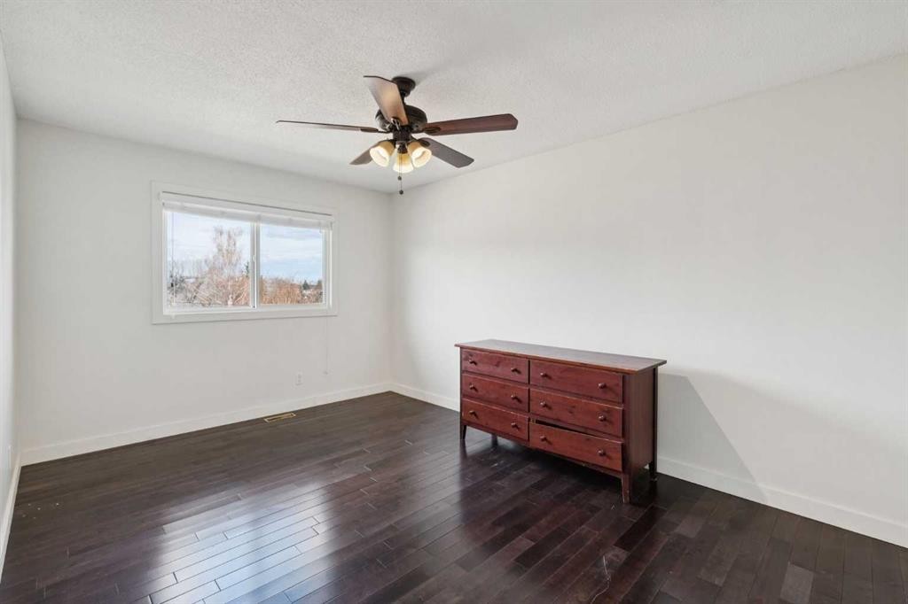 214 Springwood Place Sw, Calgary, AB - Indoor Photo Showing Other Room