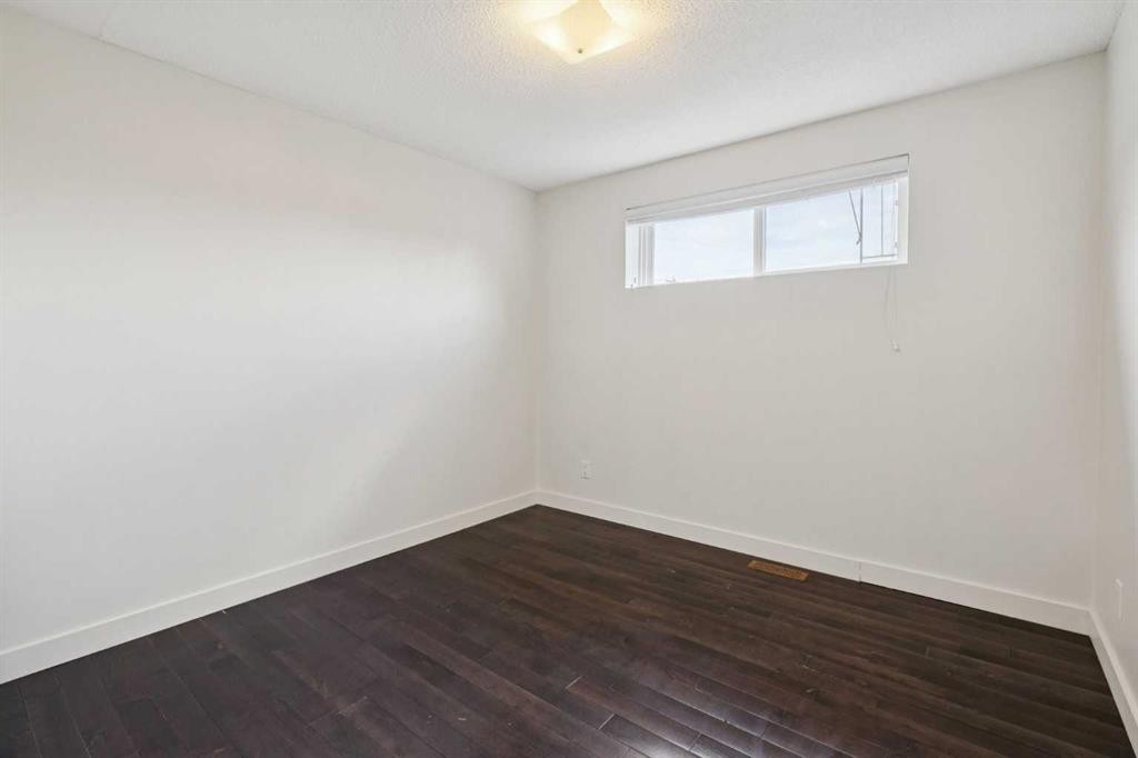 214 Springwood Place Sw, Calgary, AB - Indoor Photo Showing Other Room