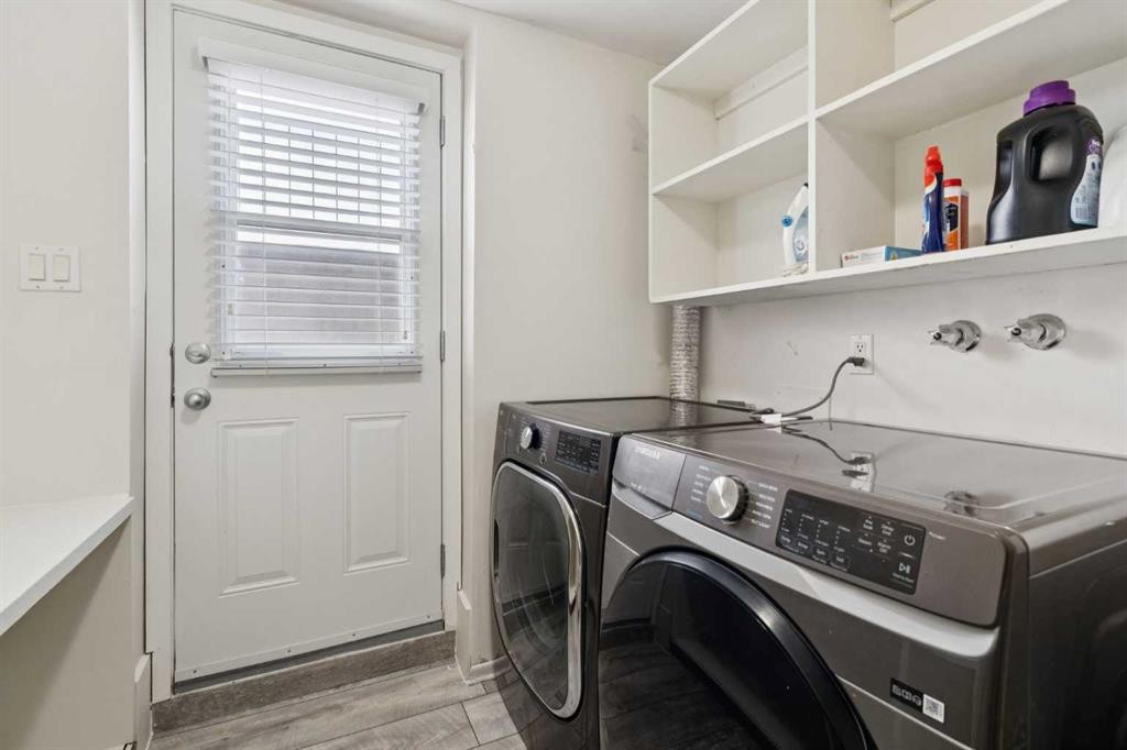 214 Springwood Place Sw, Calgary, AB - Indoor Photo Showing Laundry Room