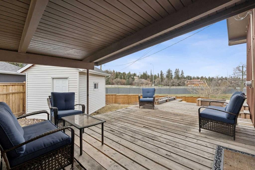 214 Springwood Place Sw, Calgary, AB - Outdoor With Deck Patio Veranda With Exterior