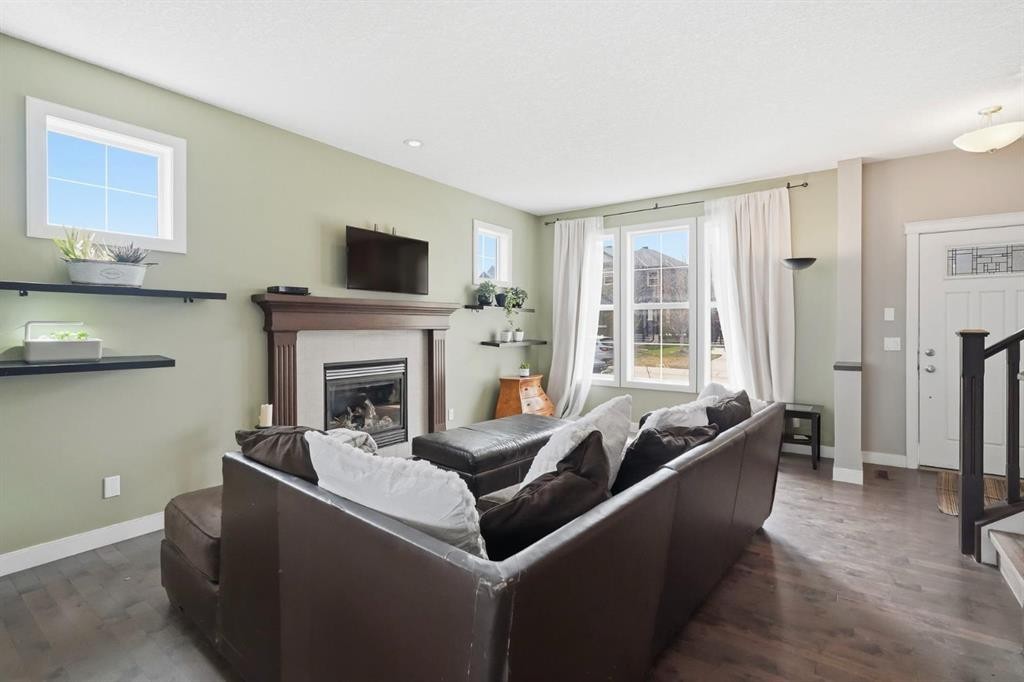 42 Sage Hill Green Nw, Calgary, AB - Indoor Photo Showing Living Room With Fireplace