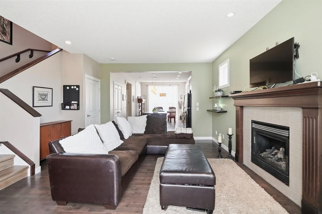 42 Sage Hill Green Nw, Calgary, AB - Indoor Photo Showing Living Room With Fireplace