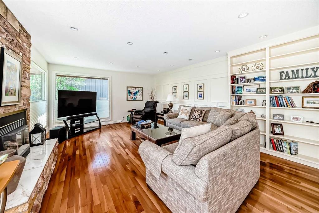 123 Varsity Estates Grove Nw, Calgary, AB - Indoor Photo Showing Living Room With Fireplace