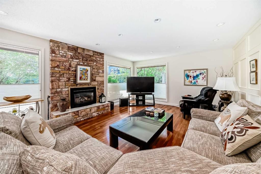 123 Varsity Estates Grove Nw, Calgary, AB - Indoor Photo Showing Living Room With Fireplace