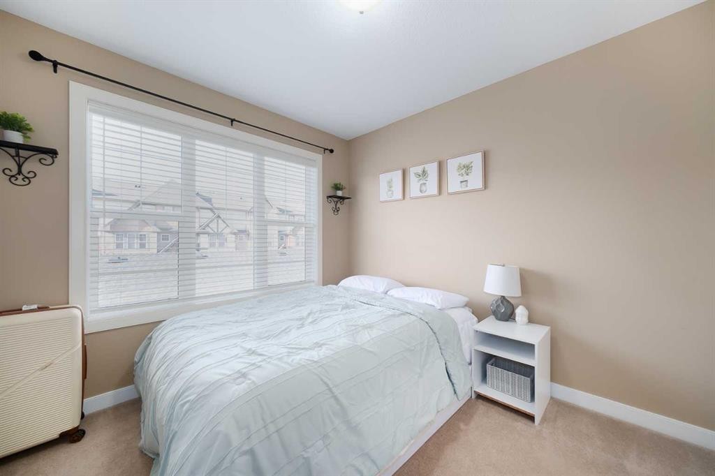 2524 Eversyde Avenue Sw, Calgary, AB - Indoor Photo Showing Bedroom