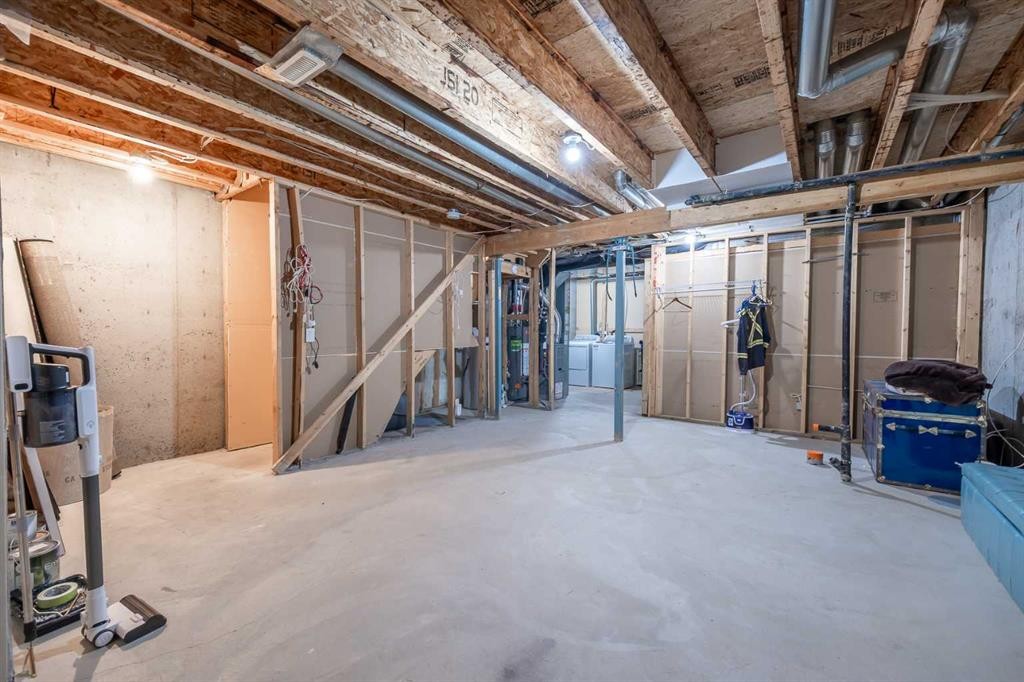 2524 Eversyde Avenue Sw, Calgary, AB - Indoor Photo Showing Basement