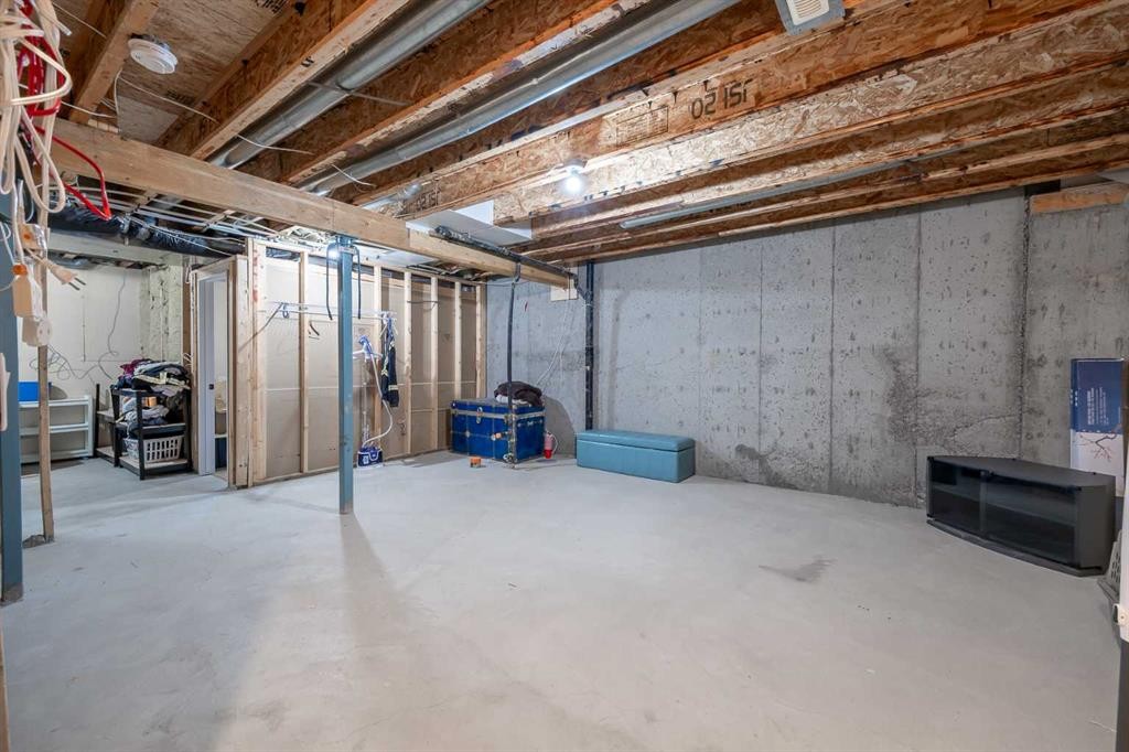 2524 Eversyde Avenue Sw, Calgary, AB - Indoor Photo Showing Basement