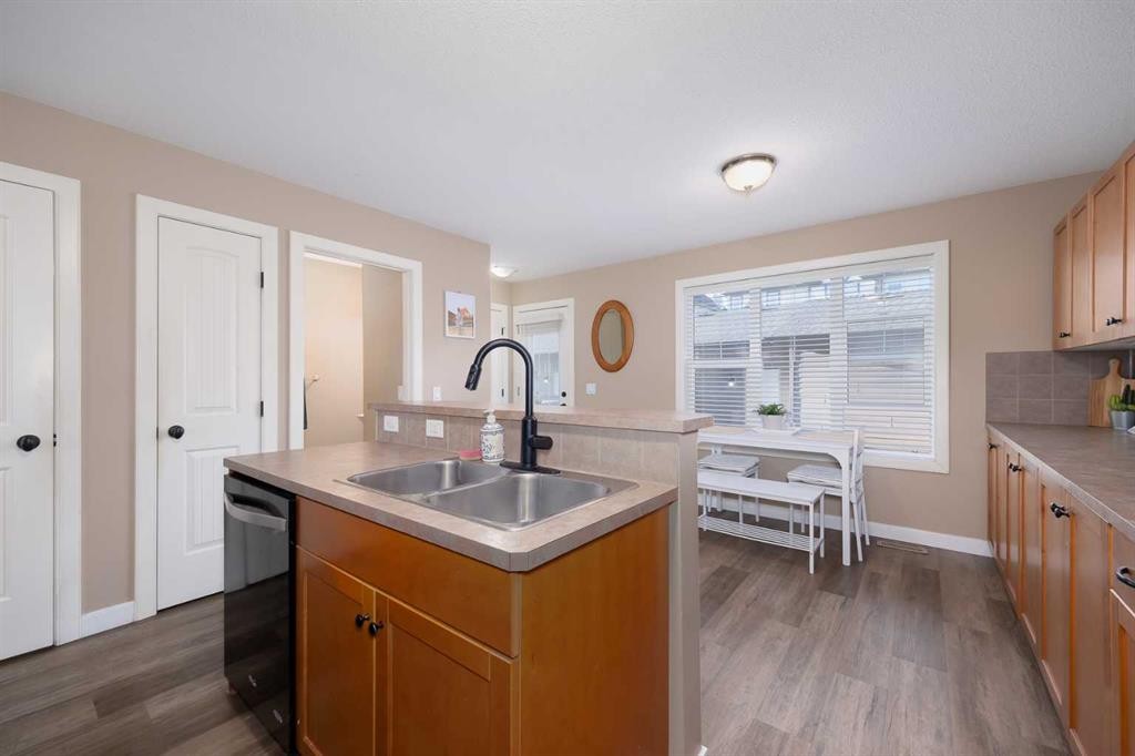 2524 Eversyde Avenue Sw, Calgary, AB - Indoor Photo Showing Kitchen With Double Sink