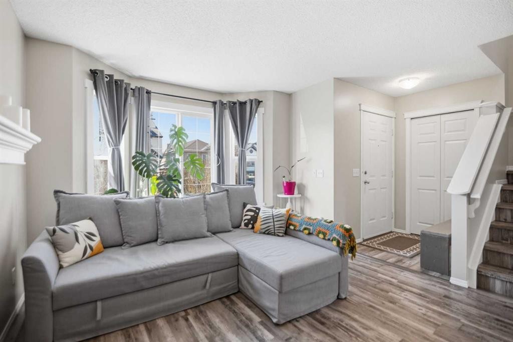 46 Saddlemont Way Ne, Calgary, AB - Indoor Photo Showing Living Room