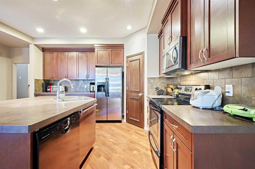 789 Panatella Boulevard Nw, Calgary, AB - Indoor Photo Showing Kitchen