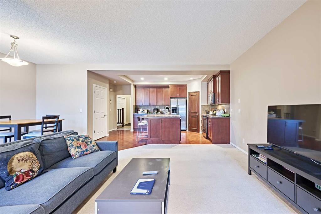 789 Panatella Boulevard Nw, Calgary, AB - Indoor Photo Showing Living Room