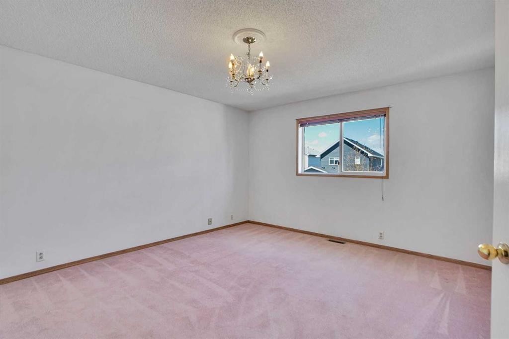 90 Martinridge Crescent Ne, Calgary, AB - Indoor Photo Showing Other Room
