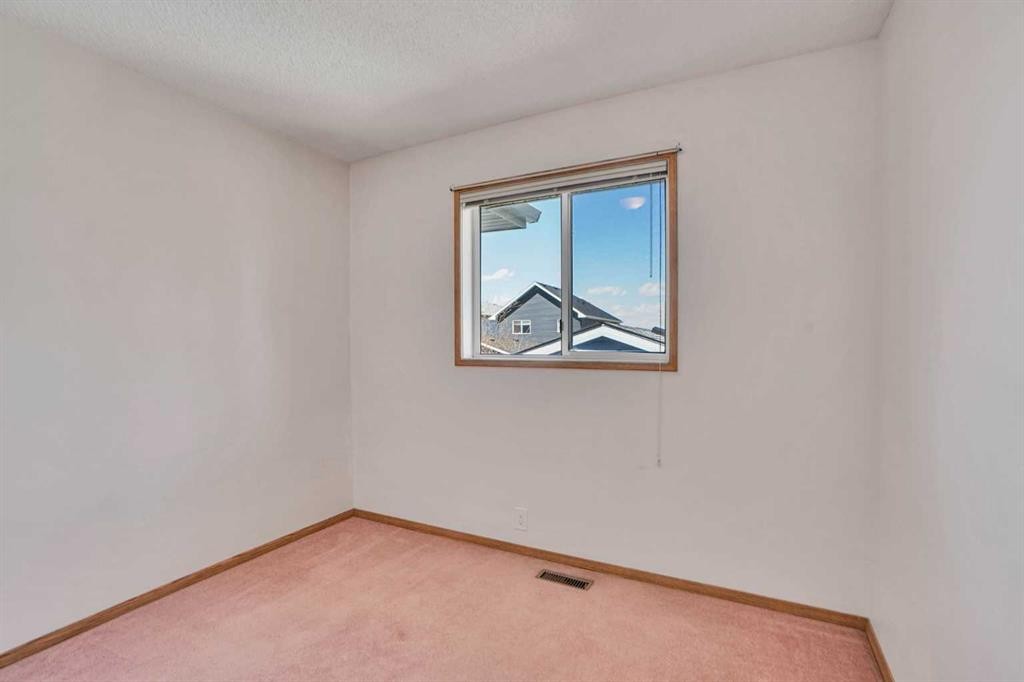 90 Martinridge Crescent Ne, Calgary, AB - Indoor Photo Showing Other Room
