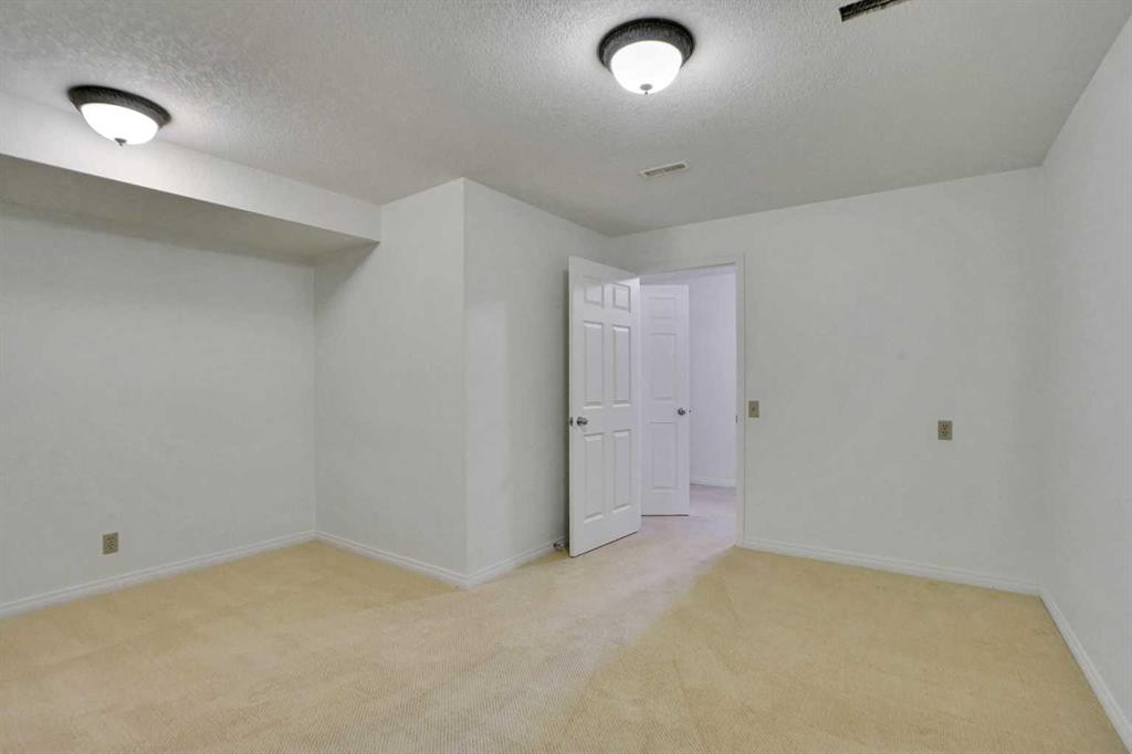 90 Martinridge Crescent Ne, Calgary, AB - Indoor Photo Showing Other Room