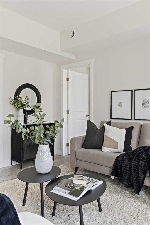 301-255 Rowmont Boulevard Nw, Calgary, AB - Indoor Photo Showing Living Room