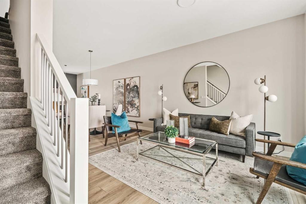 26 Rowmont Heath Nw, Calgary, AB - Indoor Photo Showing Living Room
