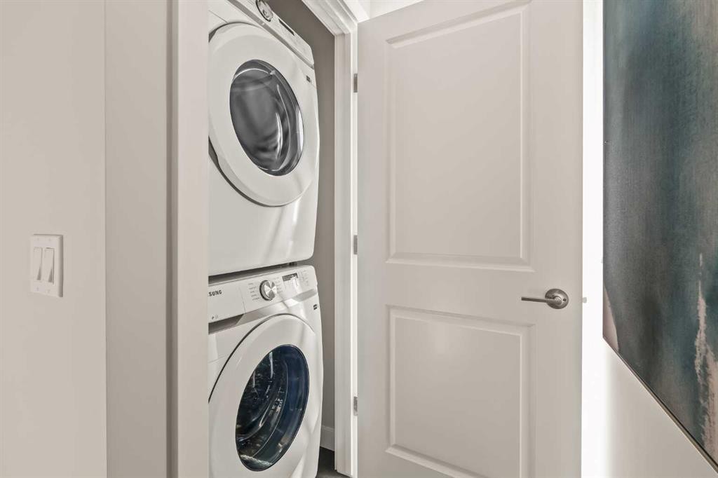 26 Rowmont Heath Nw, Calgary, AB - Indoor Photo Showing Laundry Room