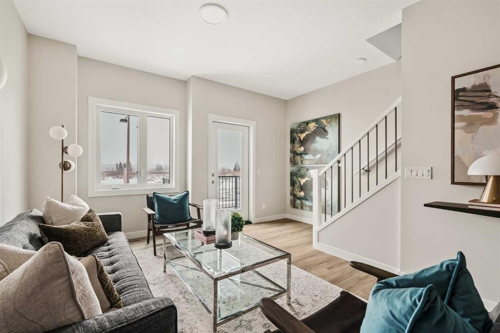 26 Rowmont Heath Nw, Calgary, AB - Indoor Photo Showing Living Room