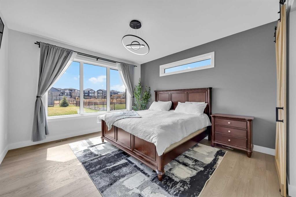 25 Cimarron Estates Gate, Okotoks, AB - Indoor Photo Showing Bedroom