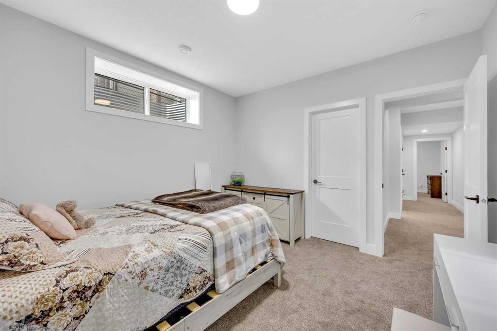 25 Cimarron Estates Gate, Okotoks, AB - Indoor Photo Showing Bedroom