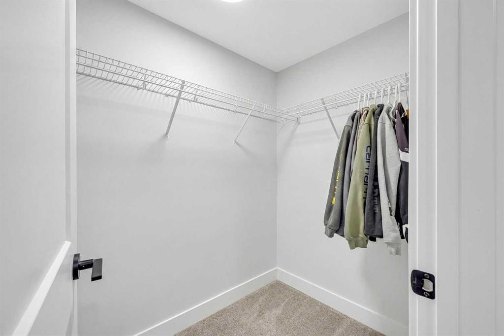 25 Cimarron Estates Gate, Okotoks, AB - Indoor With Storage