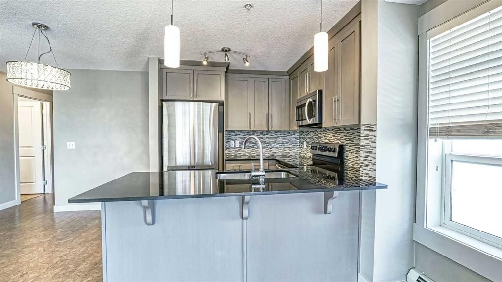 2201-155 Skyview Ranch Way Ne, Calgary, AB - Indoor Photo Showing Kitchen With Upgraded Kitchen