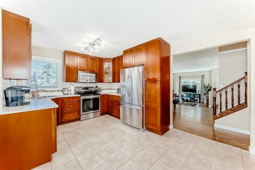 127 Mckerrell Way Se, Calgary, AB - Indoor Photo Showing Kitchen With Stainless Steel Kitchen