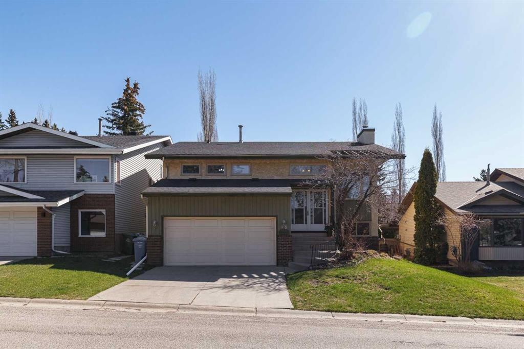 48 Ranchridge Drive Nw, Calgary, AB - Outdoor With Facade