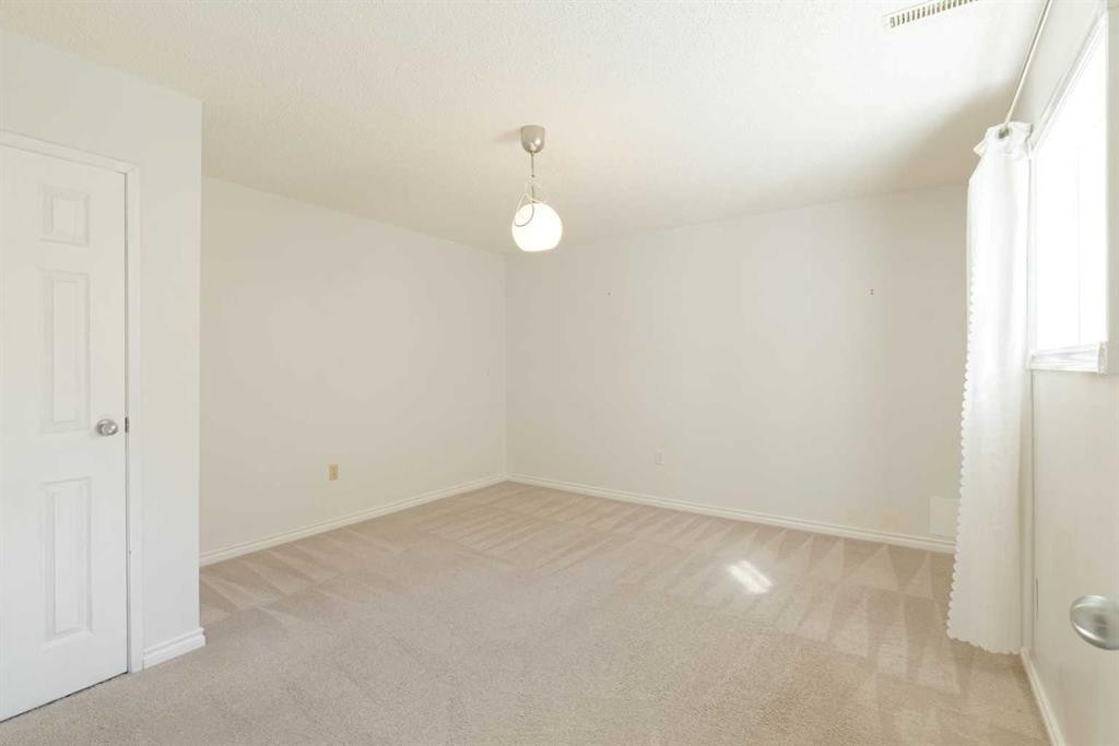 48 Ranchridge Drive Nw, Calgary, AB - Indoor Photo Showing Other Room
