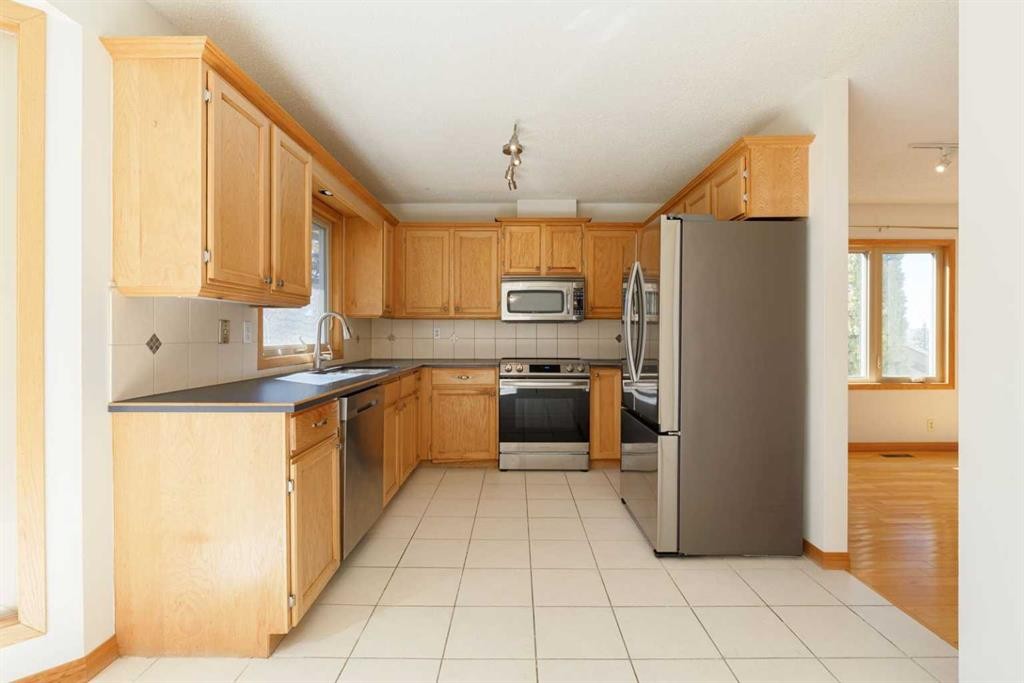 48 Ranchridge Drive Nw, Calgary, AB - Indoor Photo Showing Kitchen With Stainless Steel Kitchen