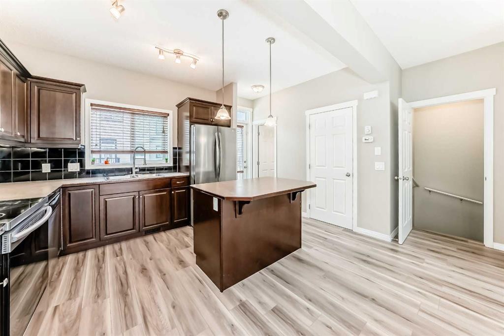78 Kincora Heath Nw, Calgary, AB - Indoor Photo Showing Kitchen With Double Sink With Upgraded Kitchen