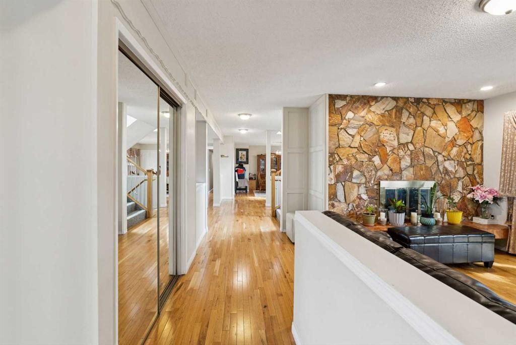 7 Willow Vale, Rural Rocky View County, AB - Indoor With Fireplace