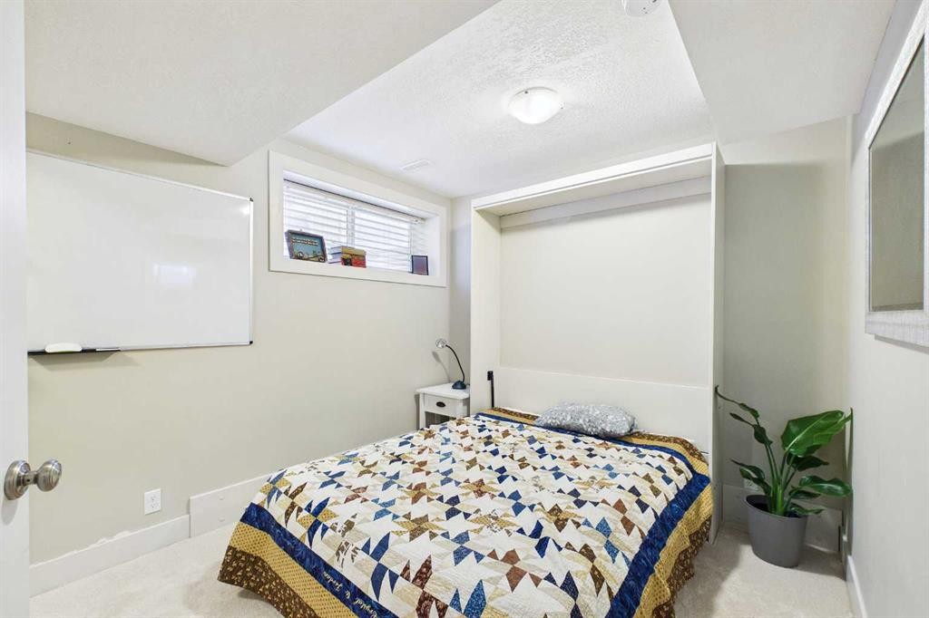 51 Nolanfield Terrace Nw, Calgary, AB - Indoor Photo Showing Bedroom