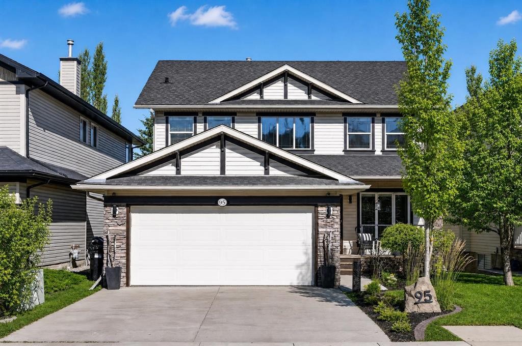 95 Crestmont Drive Sw, Calgary, AB - Outdoor With Facade