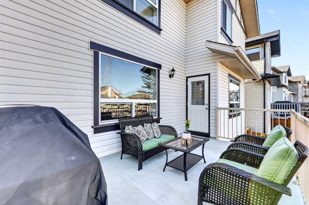 95 Crestmont Drive Sw, Calgary, AB - Outdoor With Deck Patio Veranda With Exterior