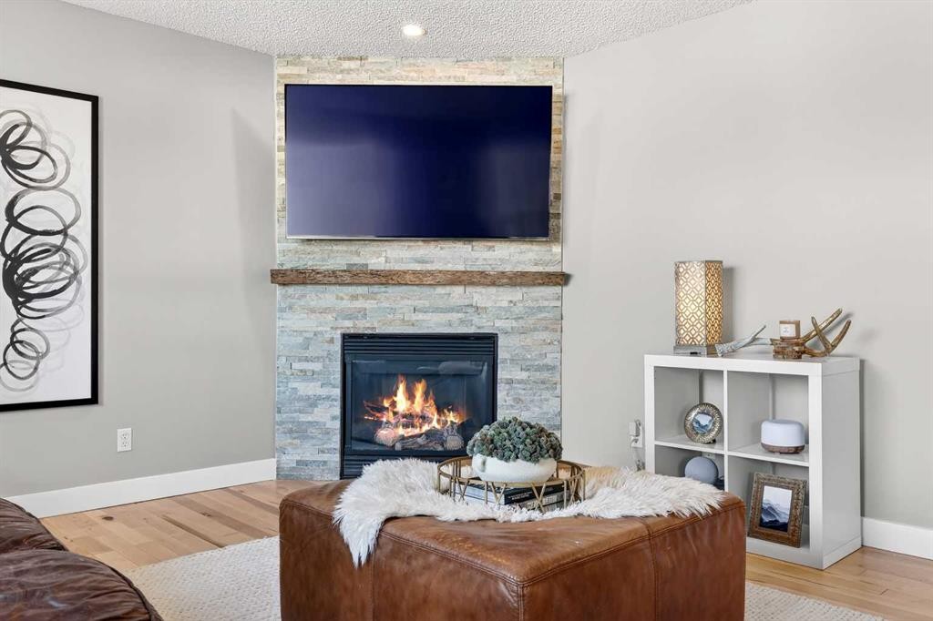 95 Crestmont Drive Sw, Calgary, AB - Indoor With Fireplace