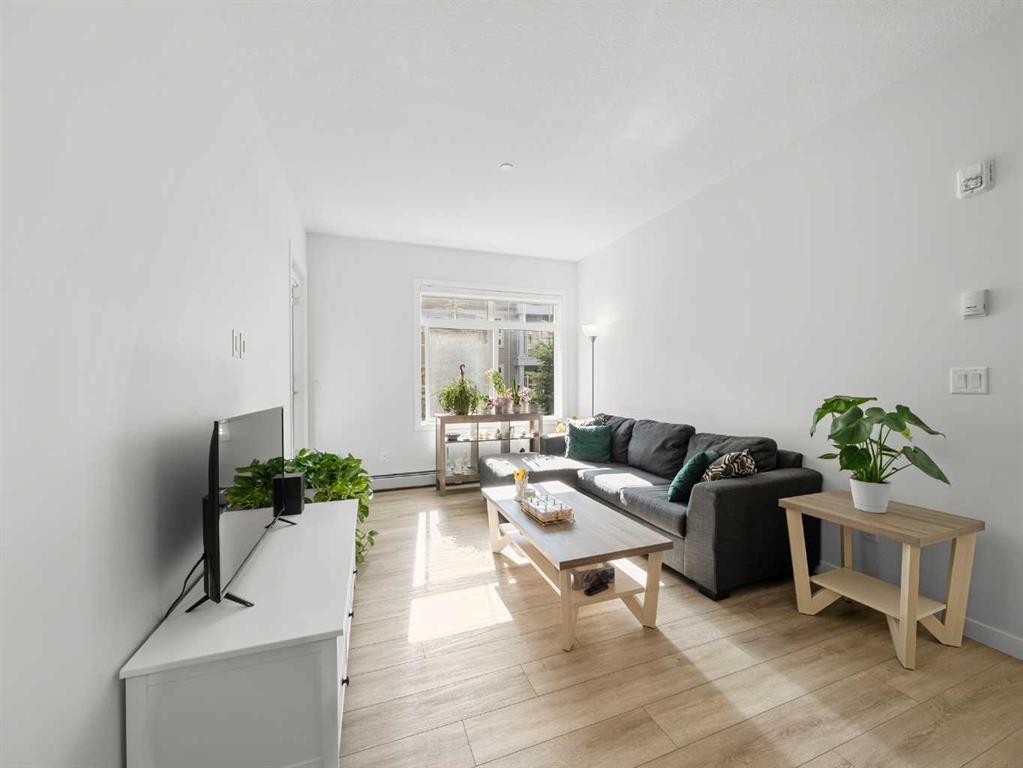 3111-3727 Sage Hill, Calgary, AB - Indoor Photo Showing Living Room