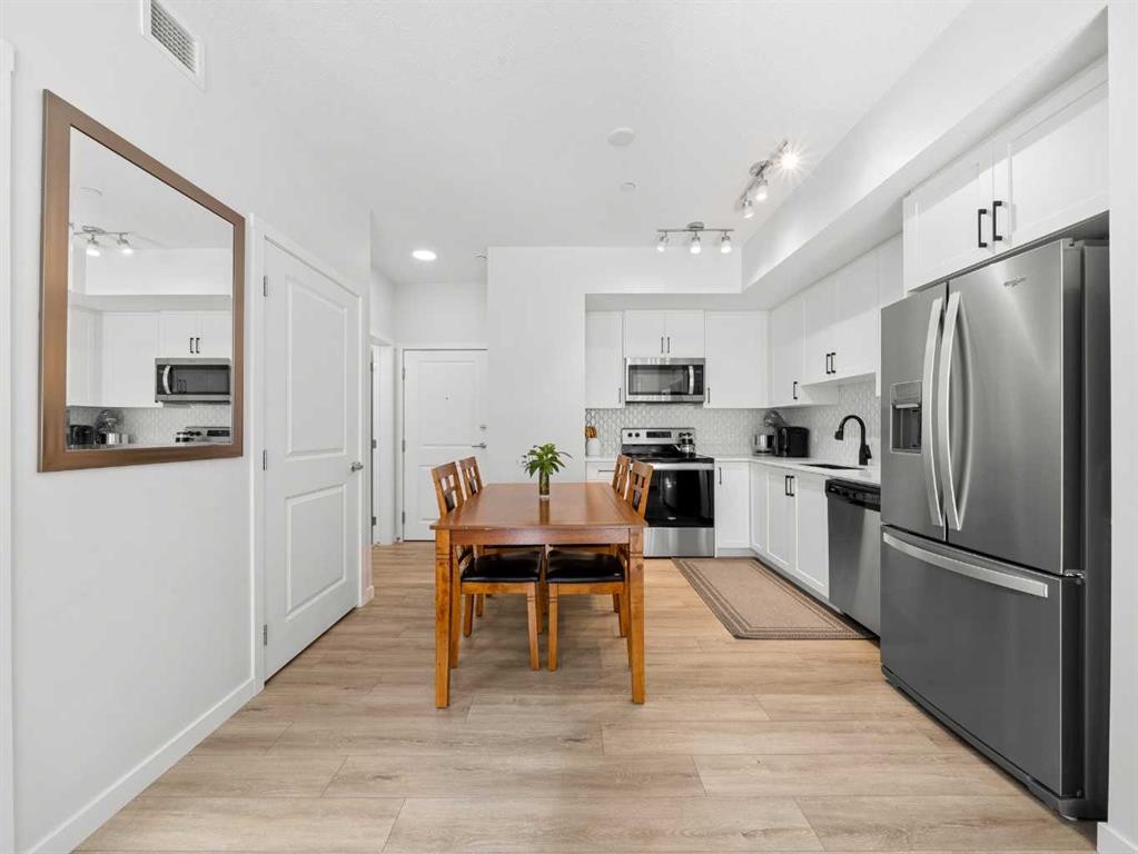 3111-3727 Sage Hill, Calgary, AB - Indoor Photo Showing Kitchen With Stainless Steel Kitchen
