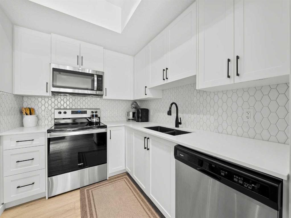 3111-3727 Sage Hill, Calgary, AB - Indoor Photo Showing Kitchen With Stainless Steel Kitchen With Double Sink With Upgraded Kitchen