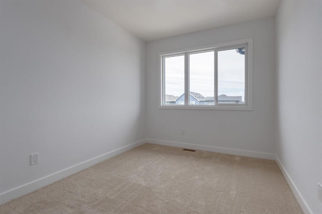 219 Sora Boulevard Se, Calgary, AB - Indoor Photo Showing Other Room