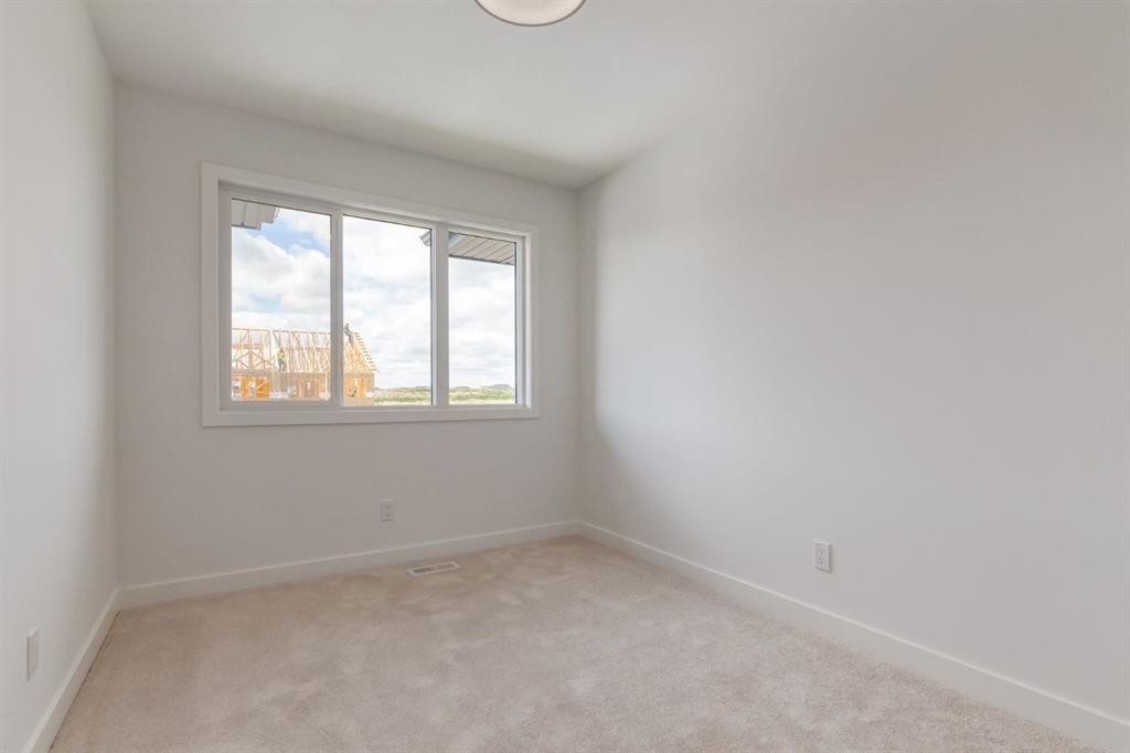 235 Sora Boulevard Se, Calgary, AB - Indoor Photo Showing Other Room