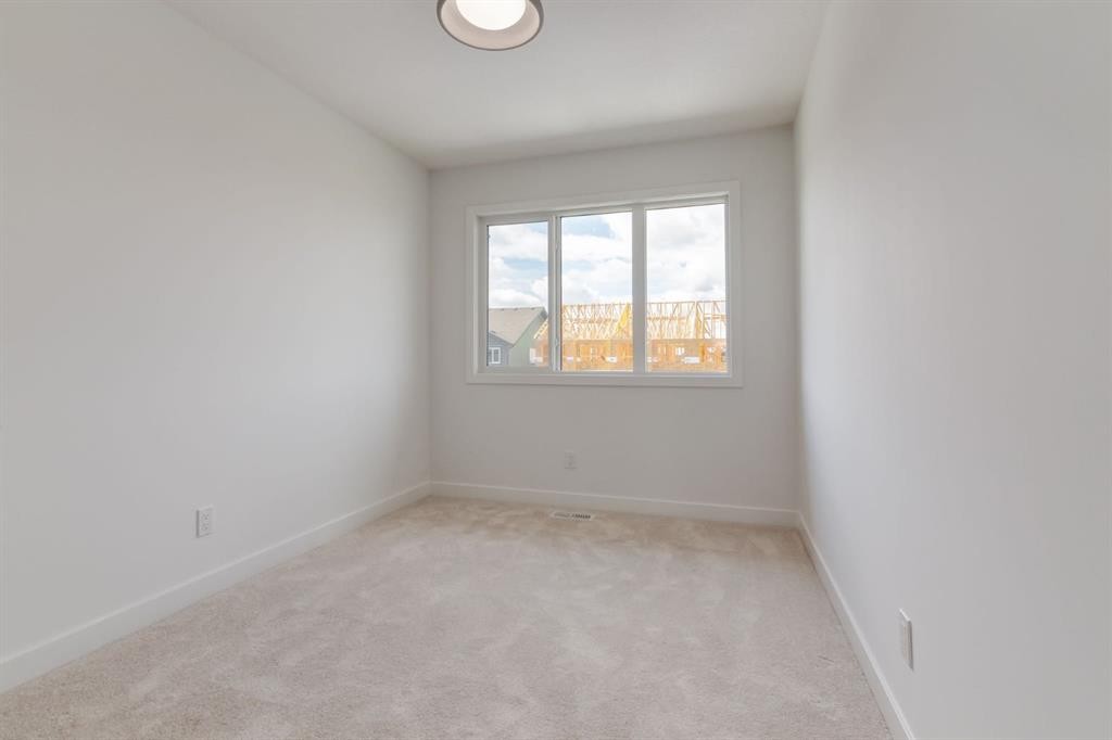 235 Sora Boulevard Se, Calgary, AB - Indoor Photo Showing Other Room